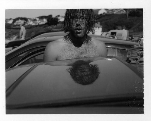 Polaroid portrait of a surfer