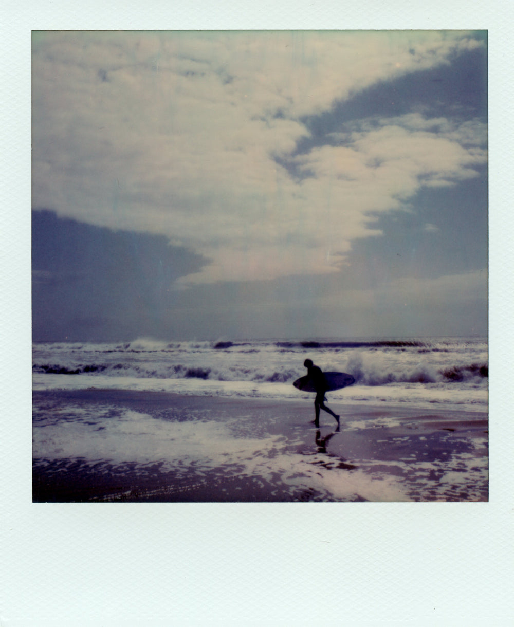 Polaroid of a surfer at Frisco, USA