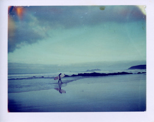Polaroid of a surfer at Godrevy