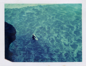 Polaroid image of a longboarder at St Agnes