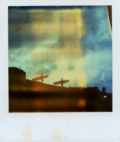Polaroid image of surfers at Godrevy
