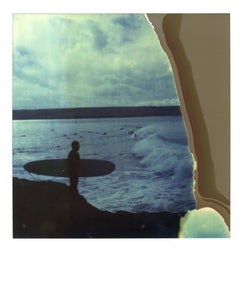 Polaroid image of a surfer at a pointbreak