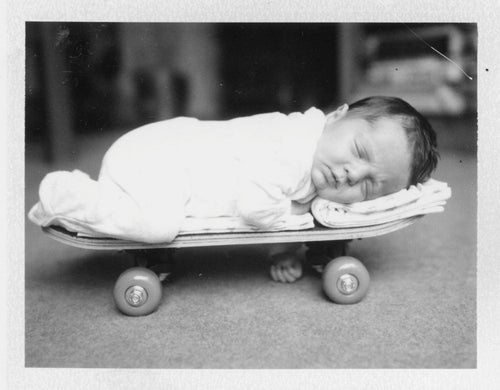 Polaroid image of child on skateboard