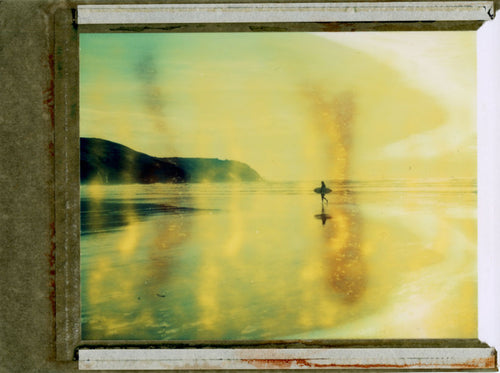 Polaroid image of a surfer at Perranporth