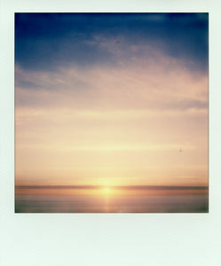 Polaroid of a sunset from St Agnes beacon